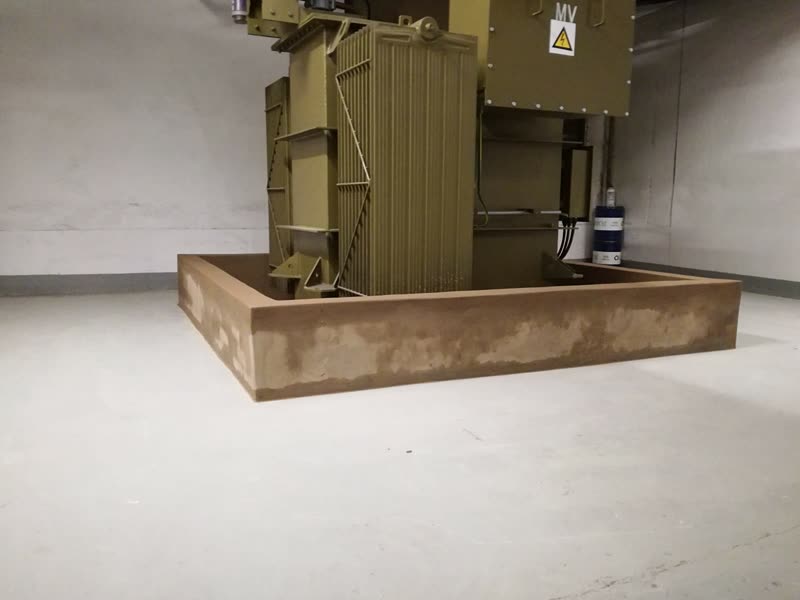 Transformer seated on its bunded concrete plinth with clearances set out