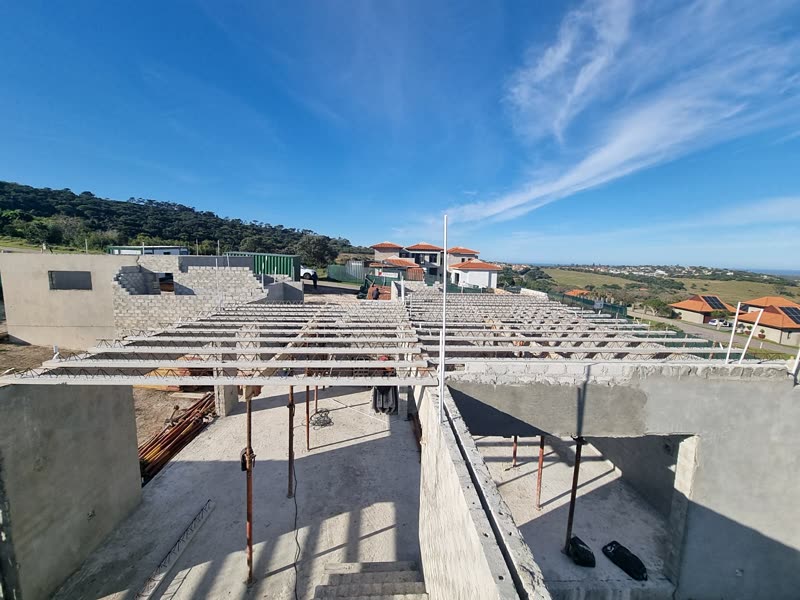 Suspended slab seen from above with the reinforcement and blockwork below